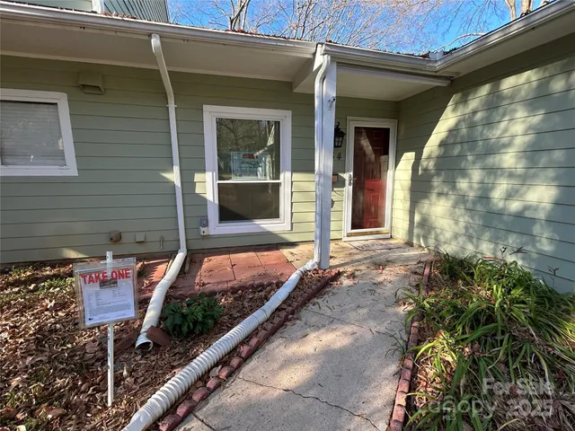 a front view of a house with street