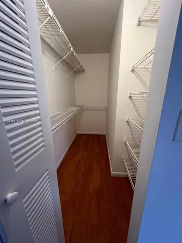 a bathroom with a toilet and a bathtub