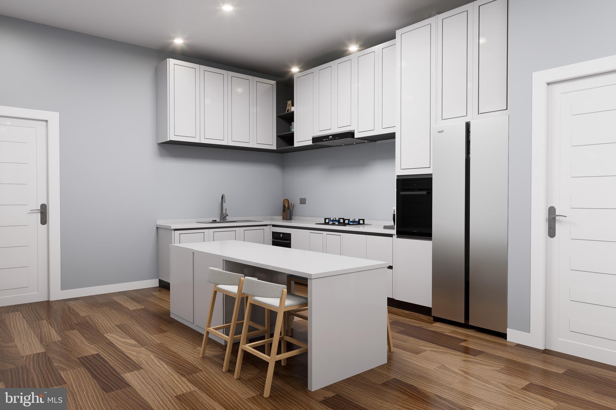 3401 Hamilton Street, Unit 13 Philadelphia, PA 19104 - Photo 6 of 33 a kitchen with stainless steel appliances cabinets a sink and a counter top space