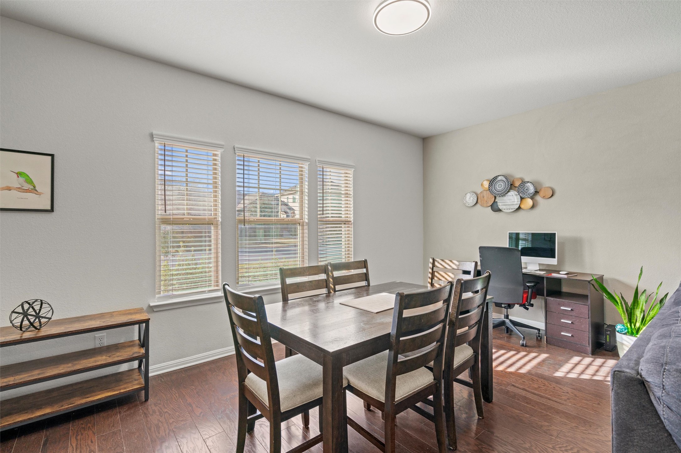 8144 Daisy Cutter Crossing Georgetown, TX 78626 - Photo 6 of 40 Dining room with hardwood / wood-style floors and baseboards