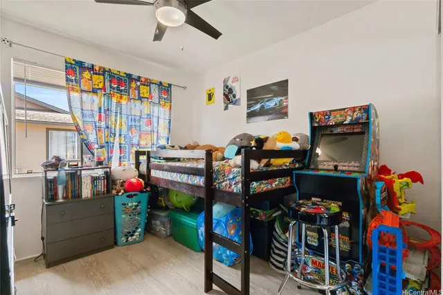 a living room with lots of furniture and toys
