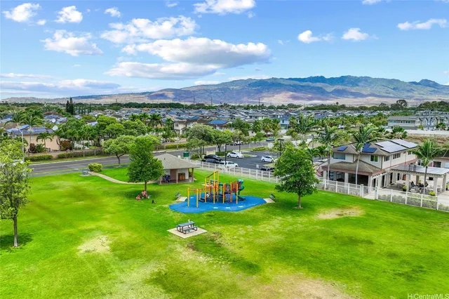 a view of a city with mountains in the background