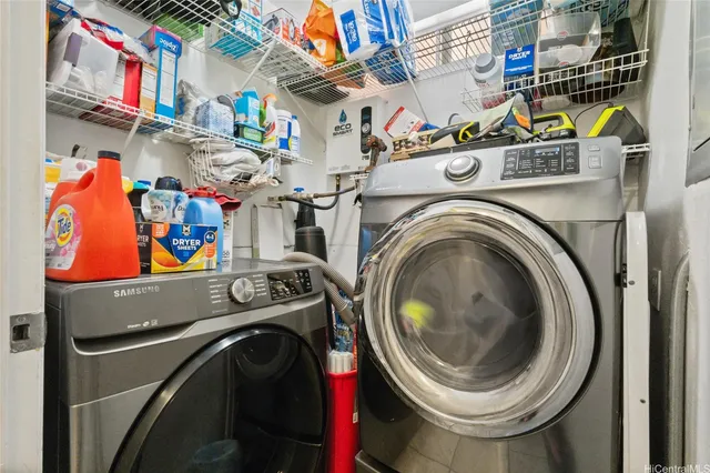 a utility room with dryer and washer