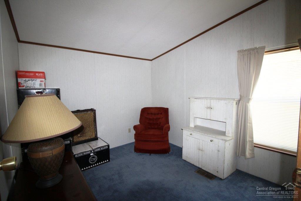19235 Kiowa Road Bend, OR 97702 - Photo 12 of 25 a living room with furniture and a window