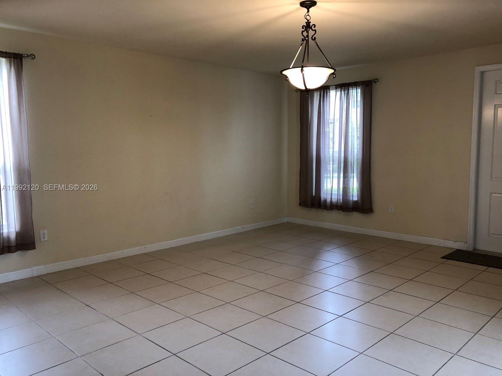 17000 Southwest 90th Terrace Miami, FL 33196 - Photo 15 of 56 a view of an empty room and window