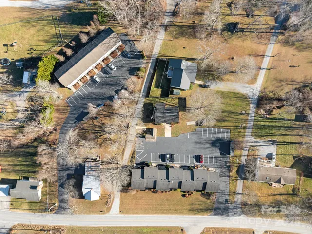 an aerial view of a building with outdoor space