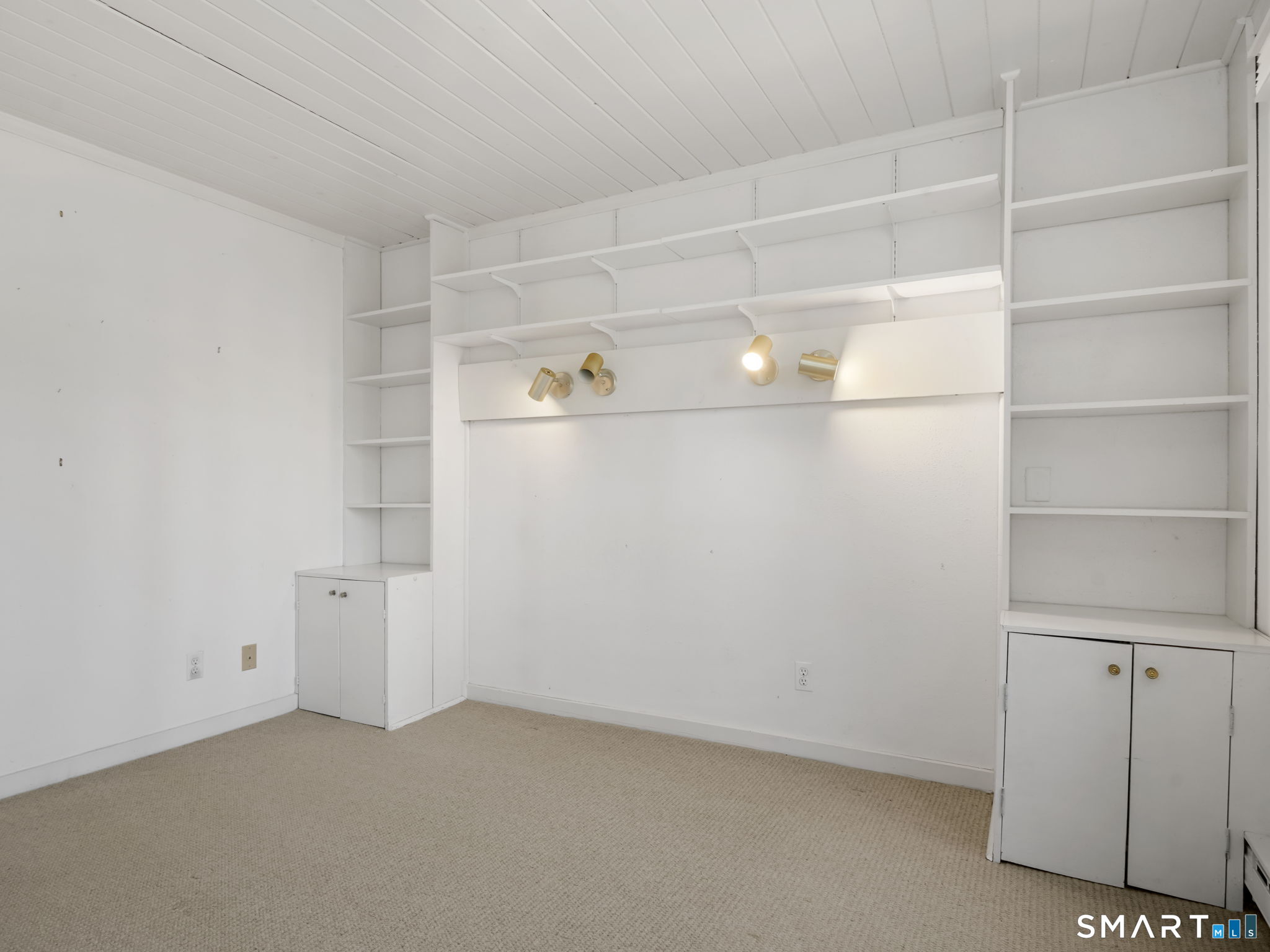 484 Cognewaugh Road Greenwich, CT 06807 - Photo 12 of 32 a view of an empty room