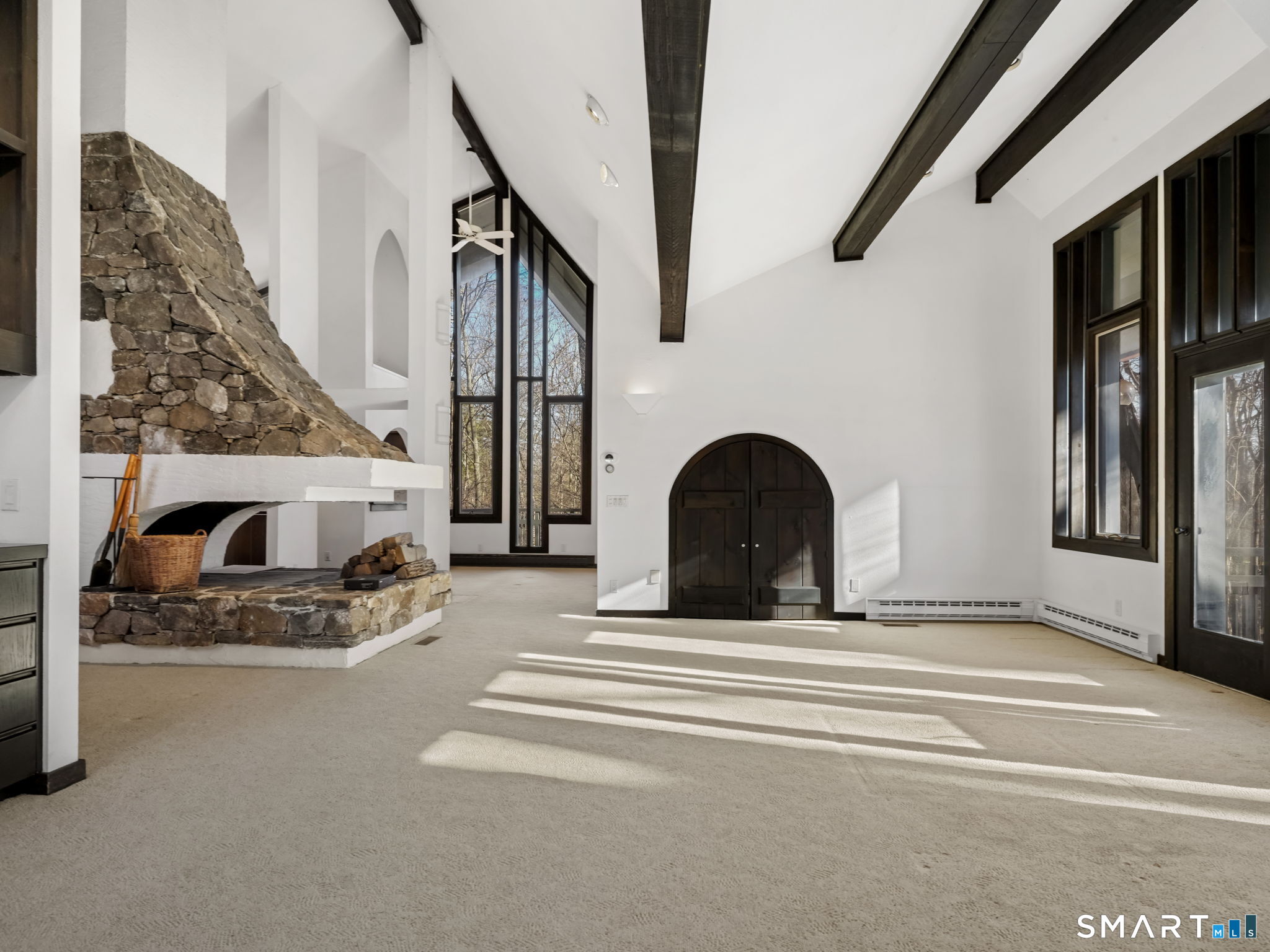 484 Cognewaugh Road Greenwich, CT 06807 - Photo 3 of 32 a view of a livingroom with furniture and staircase