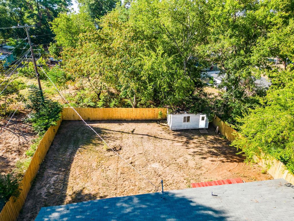 312 Germany Street Lone Star, TX 75668 - Photo 16 of 18 a view of outdoor space and yard