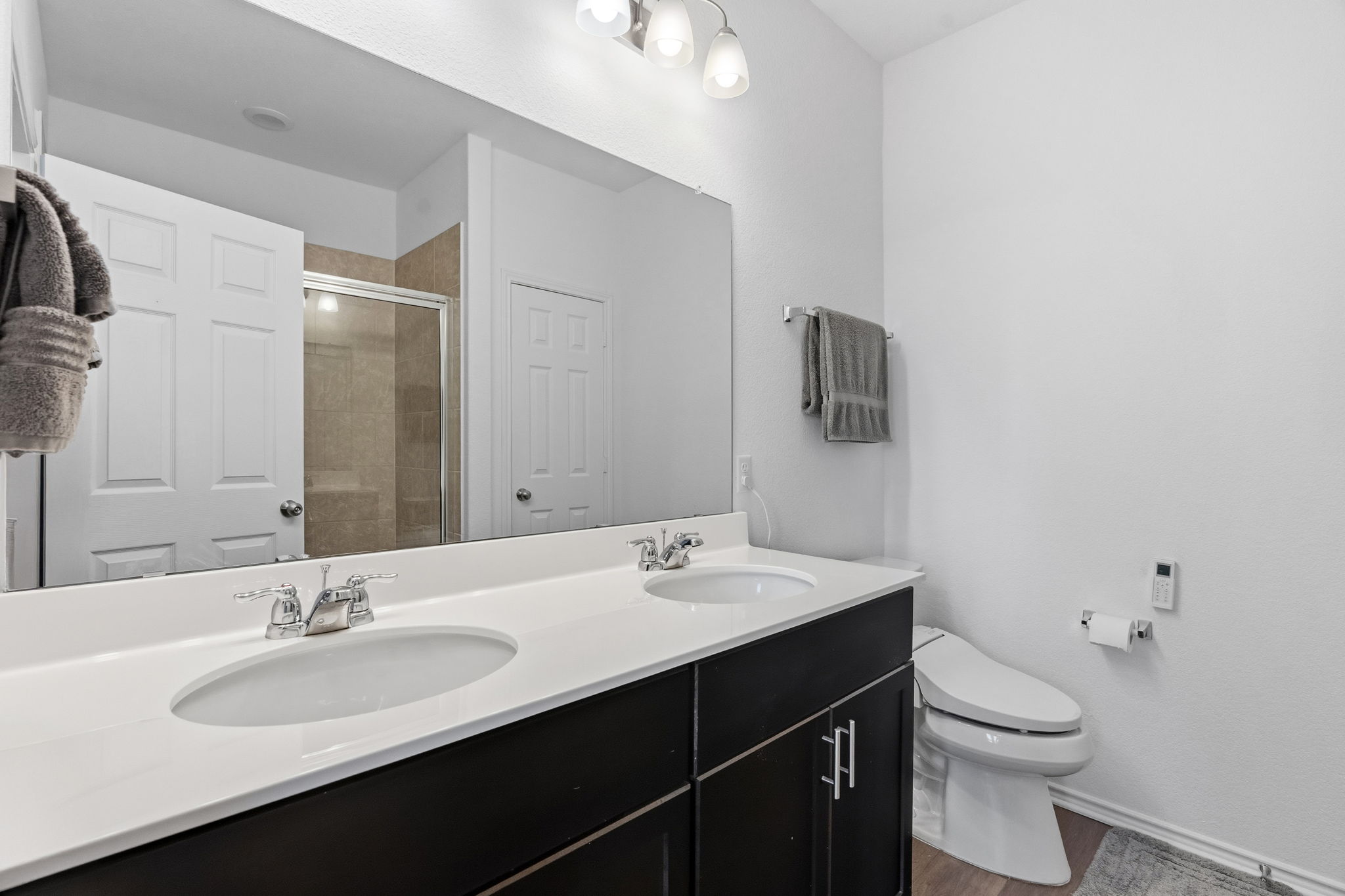 1600 Hope Rnch Road Leander, TX 78641 - Photo 16 of 23 a bathroom with a sink and a mirror