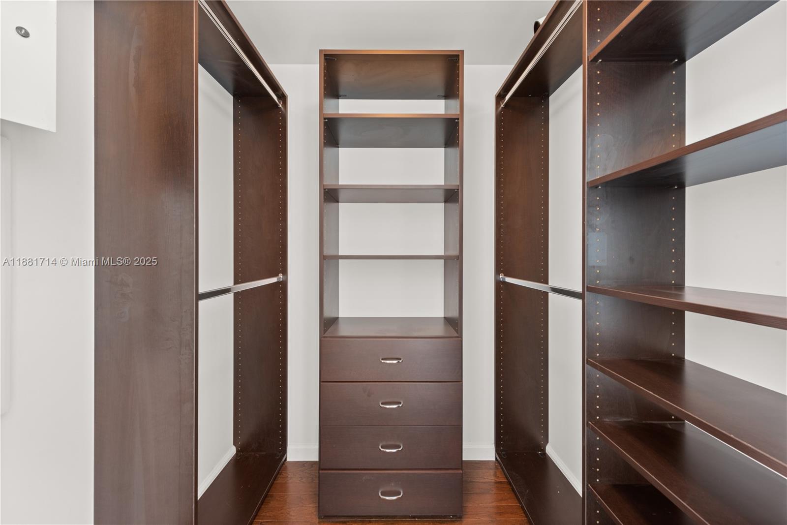 495 Brickell Avenue, Unit 5003 Miami, FL 33131 - Photo 13 of 21 a view of walk in closet with empty racks