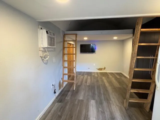 a view of livingroom with furniture and wooden floor