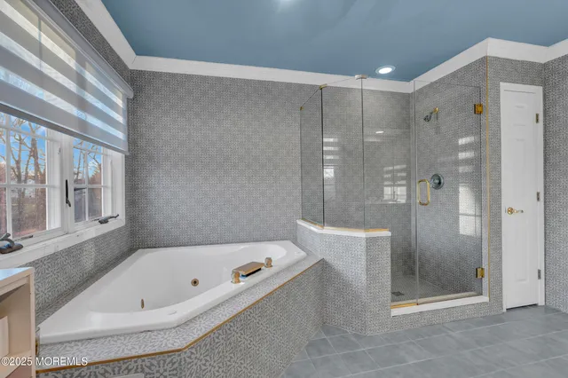 a bathroom with a sink and a large mirror