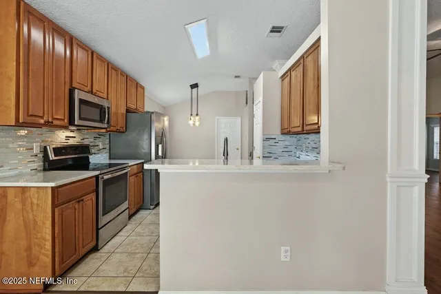 a utility room with washer and dryer