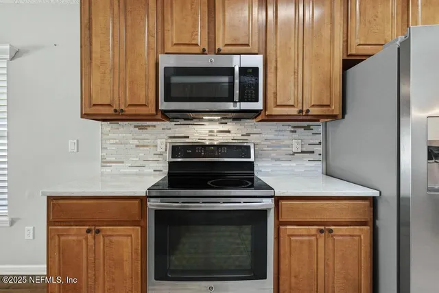 an empty room with a view of a bathroom