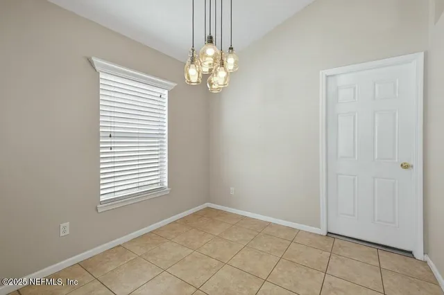 a view of an outdoor sitting area with furniture