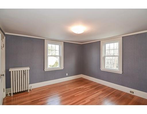 9 Merrill Road Watertown, MA 02472 - Photo 11 of 14 a view of an empty room with wooden floor and a window