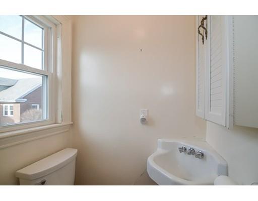9 Merrill Road Watertown, MA 02472 - Photo 8 of 14 a bathroom with a bathtub and a window