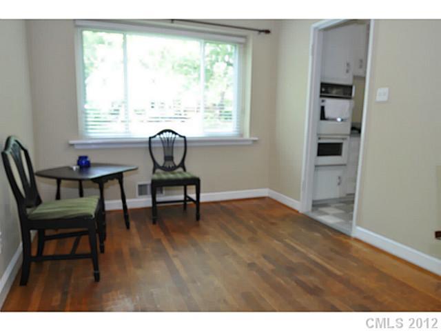 4331 Applegate Road Charlotte, NC 28209 - Photo 15 of 16 a view of a workspace with furniture and a window
