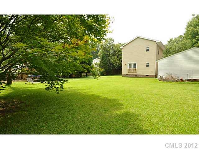 4331 Applegate Road Charlotte, NC 28209 - Photo 16 of 16 a view of a house with a yard