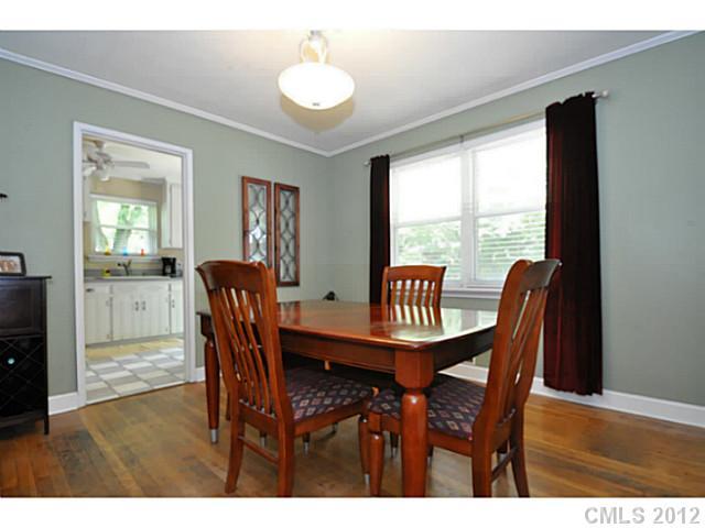 4331 Applegate Road Charlotte, NC 28209 - Photo 3 of 16 a view of a dining room with furniture window and wooden floor