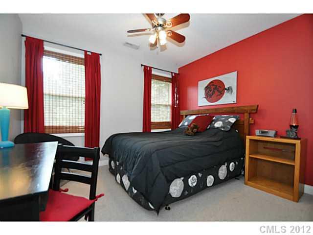 4331 Applegate Road Charlotte, NC 28209 - Photo 6 of 16 a bedroom with a bed and a window