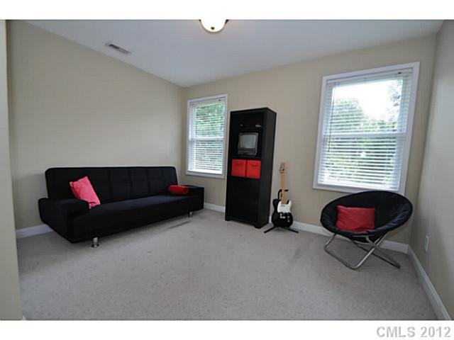 4331 Applegate Road Charlotte, NC 28209 - Photo 7 of 16 a living room with furniture and a window