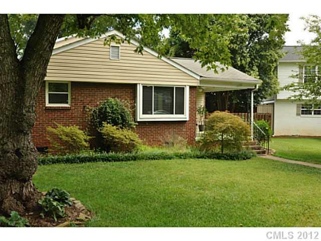 4331 Applegate Road Charlotte, NC 28209 - Photo 9 of 16 a front view of a house with a garden