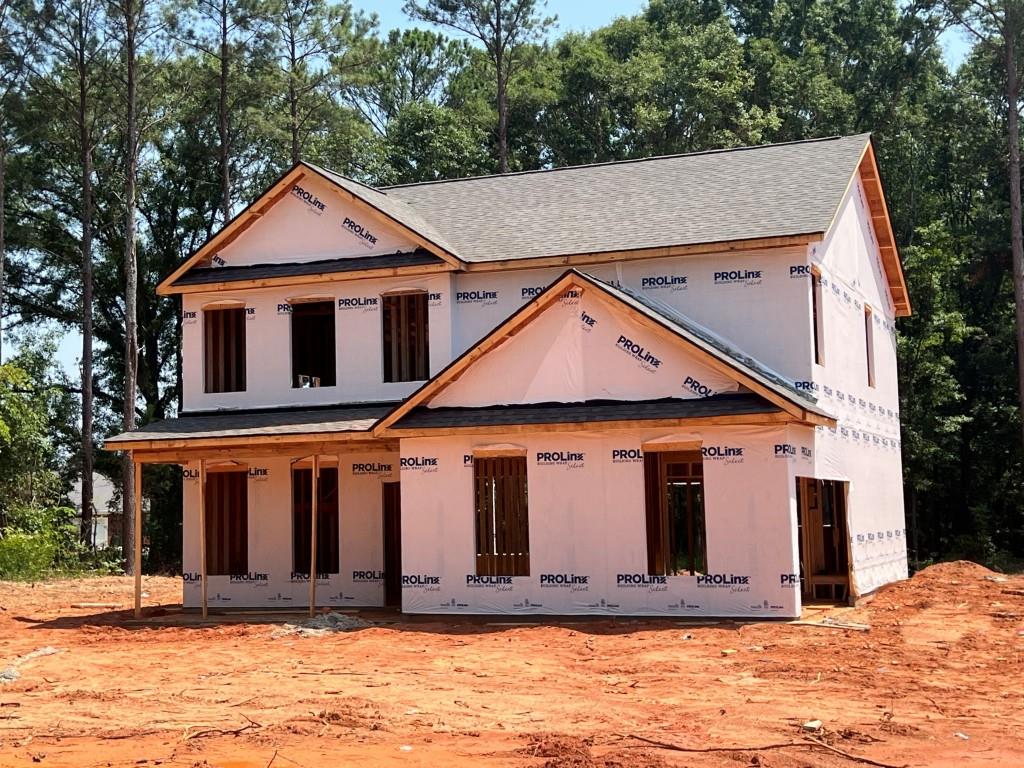 1140 Gene Bell Road Northeast Monroe, GA 30655 - Photo 1 of 1 a front view of a house with a yard