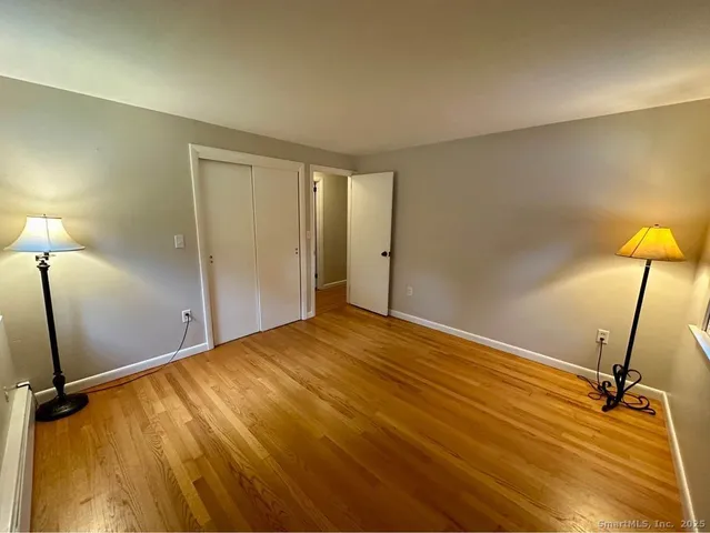 a view of room with a flat screen tv