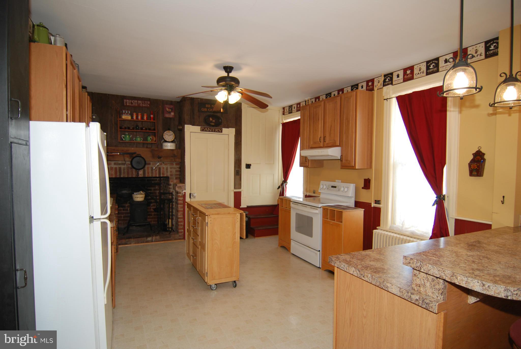 4256 Main Street Rohrersville, MD 21779 - Photo 2 of 26 a kitchen with refrigerator and window