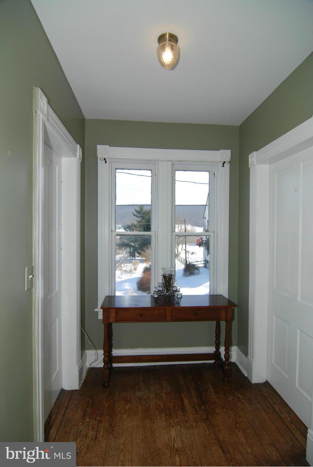 4256 Main Street Rohrersville, MD 21779 - Photo 18 of 26 a view of room with window and hardwood floor