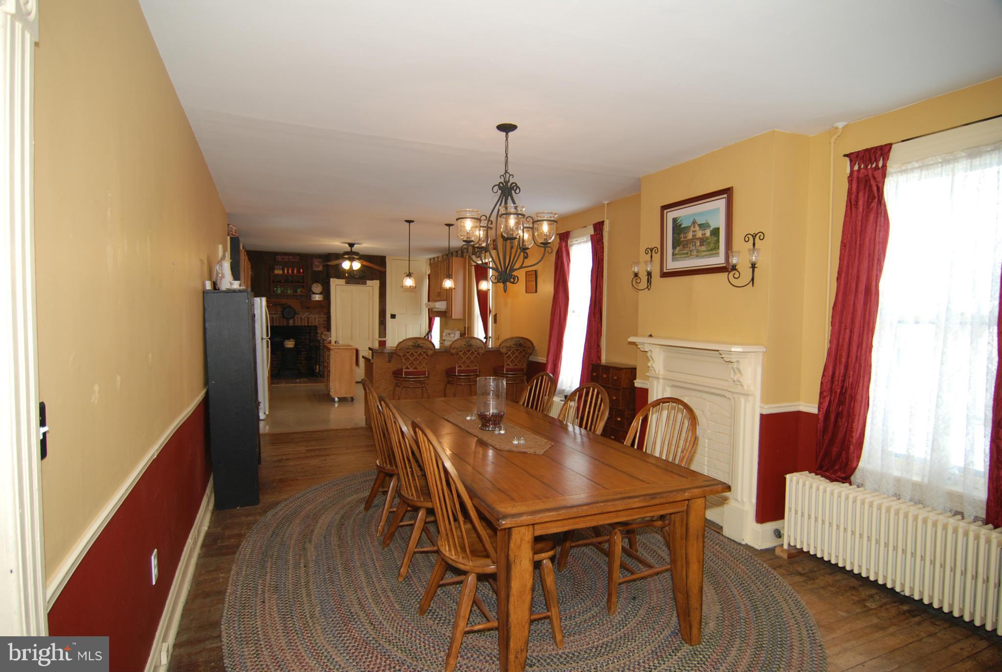 4256 Main Street Rohrersville, MD 21779 - Photo 6 of 26 a dining room with furniture window and wooden floor