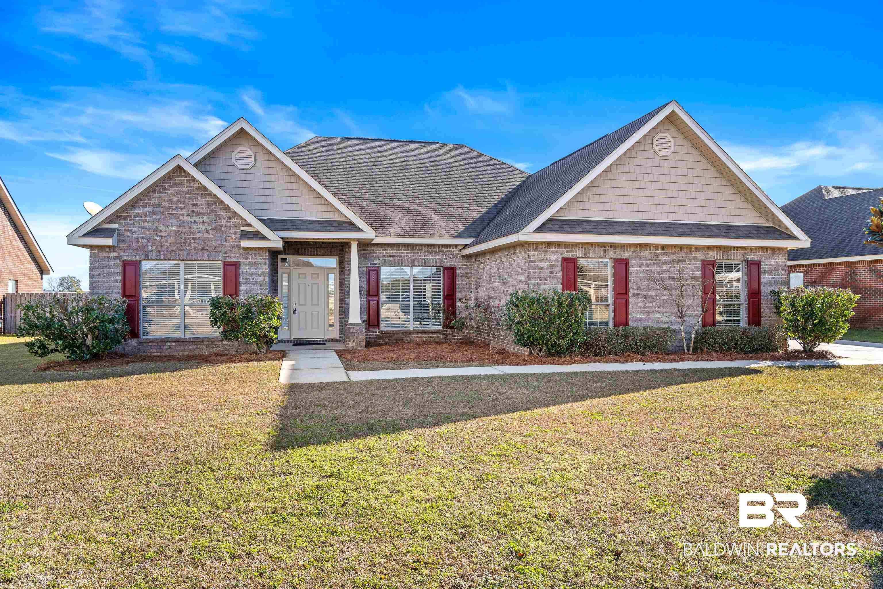 25350 Spindle Lane Daphne, AL 36526 - Photo 1 of 32 View of front facade with a front lawn