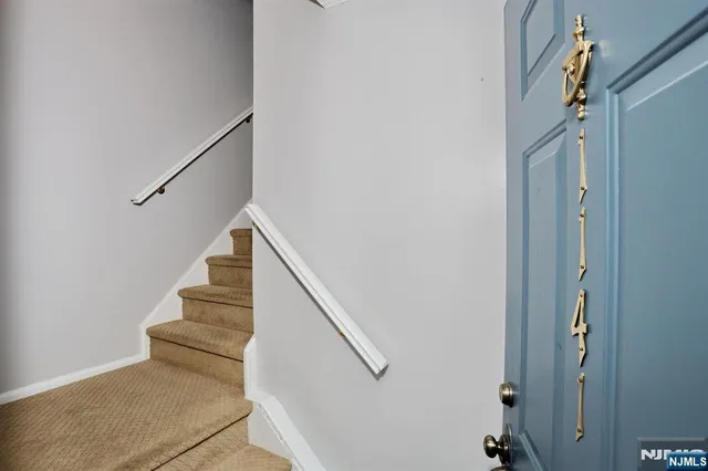 a view of entryway with stairs