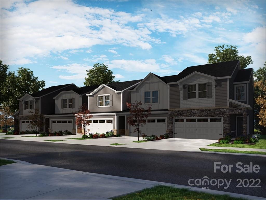 a view of a street sign on the side of building