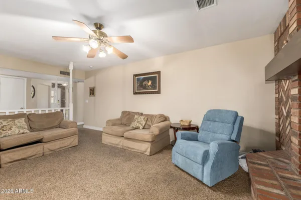 a living room with furniture and a couch