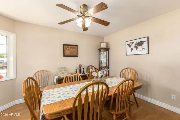 a view of a dining room with furniture