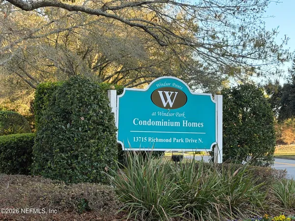a sign on the side of a road