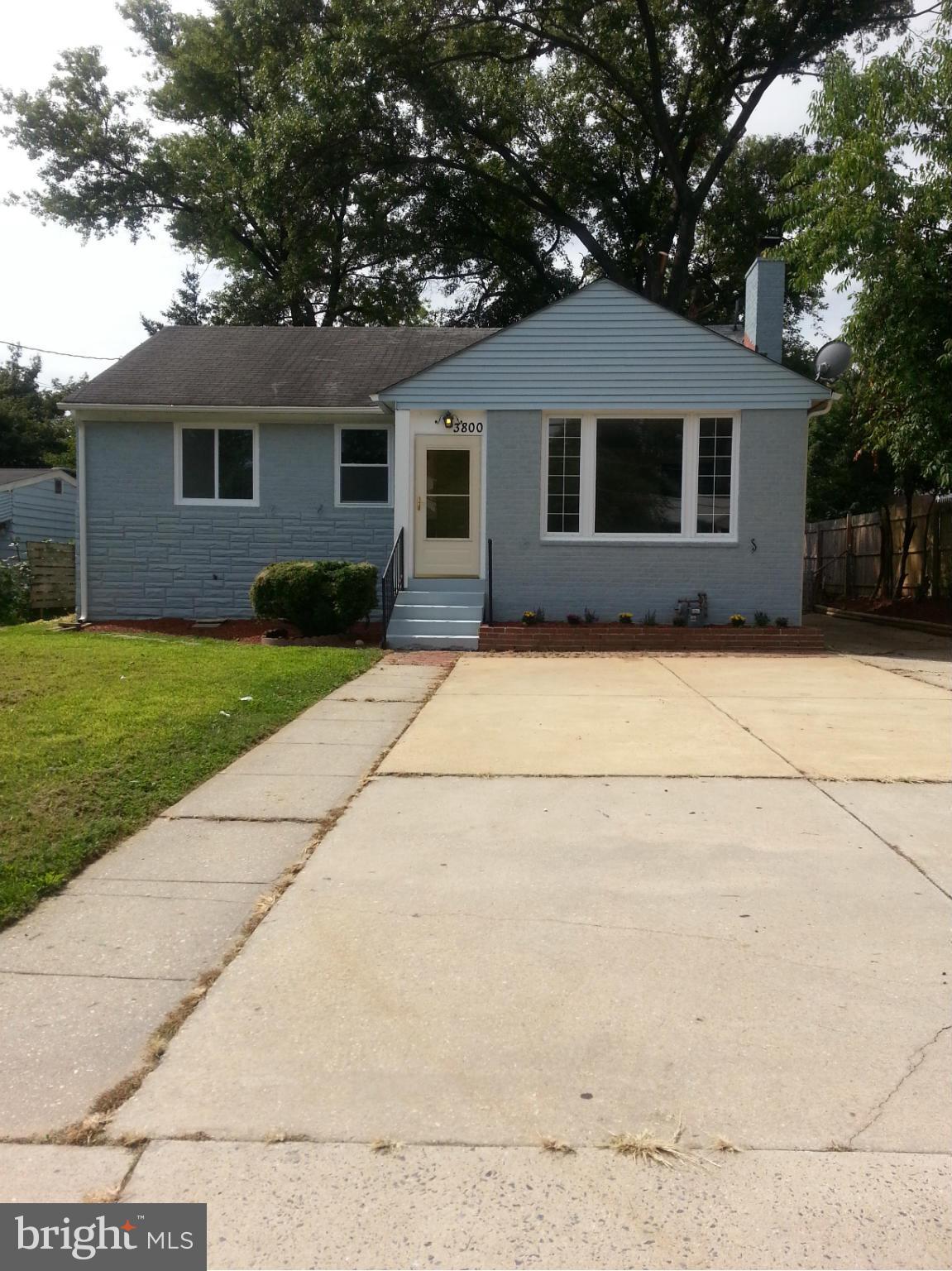 3800 Randolph Road Silver Spring, MD 20902 - Photo 1 of 23 a front view of a house with yard