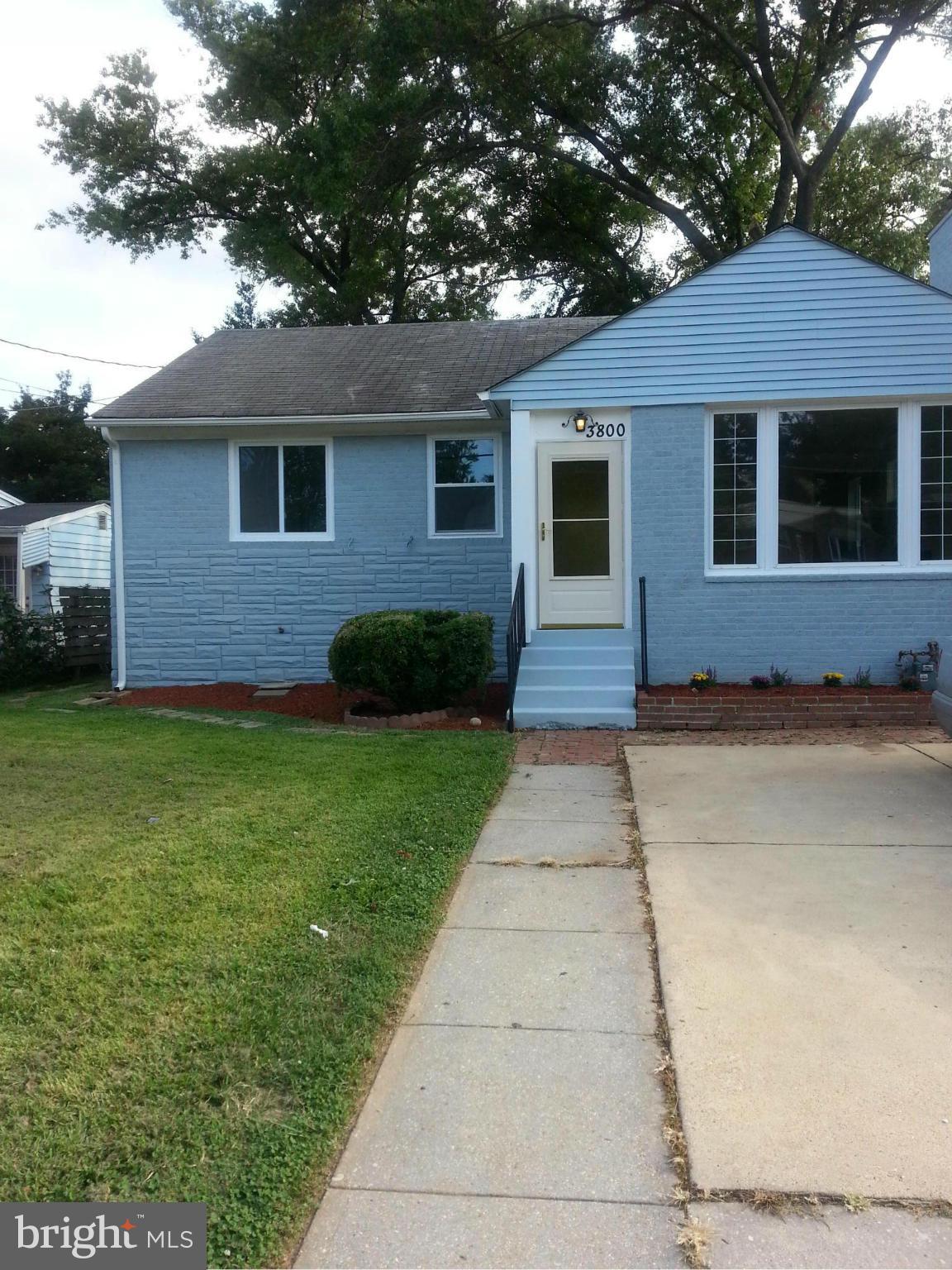 3800 Randolph Road Silver Spring, MD 20902 - Photo 2 of 23 a front view of a house with a garden