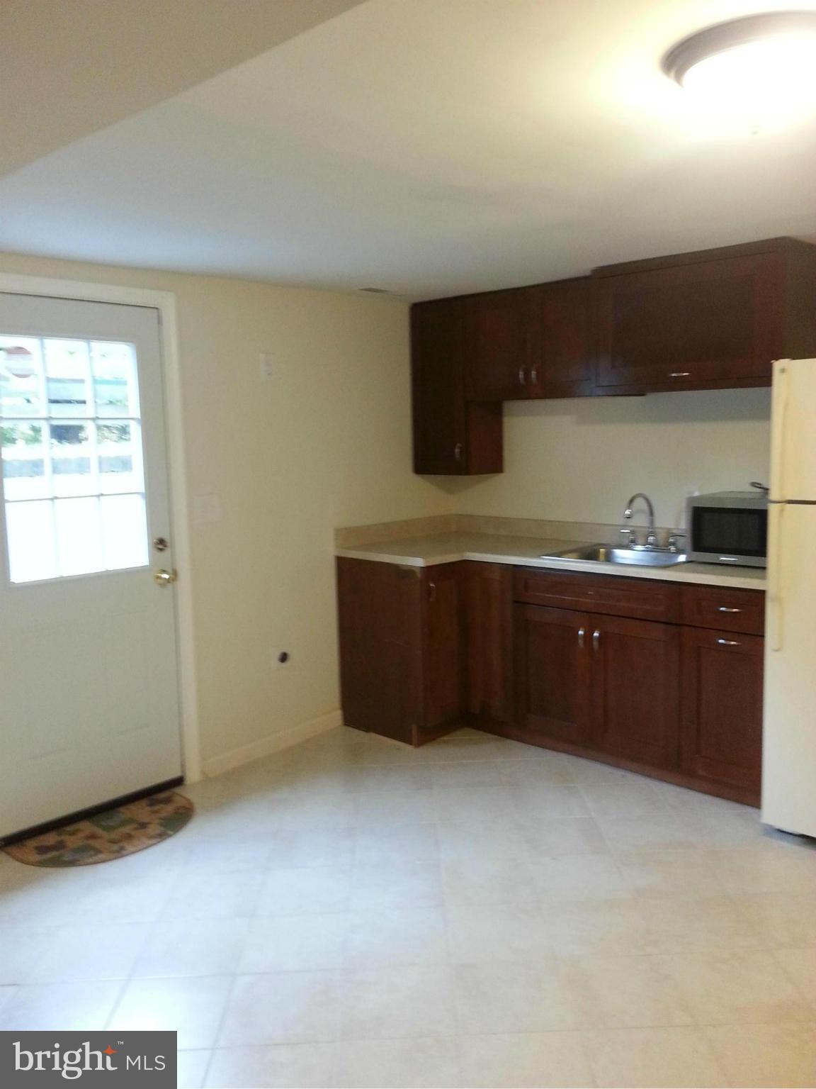 3800 Randolph Road Silver Spring, MD 20902 - Photo 18 of 23 a room with cabinets and window