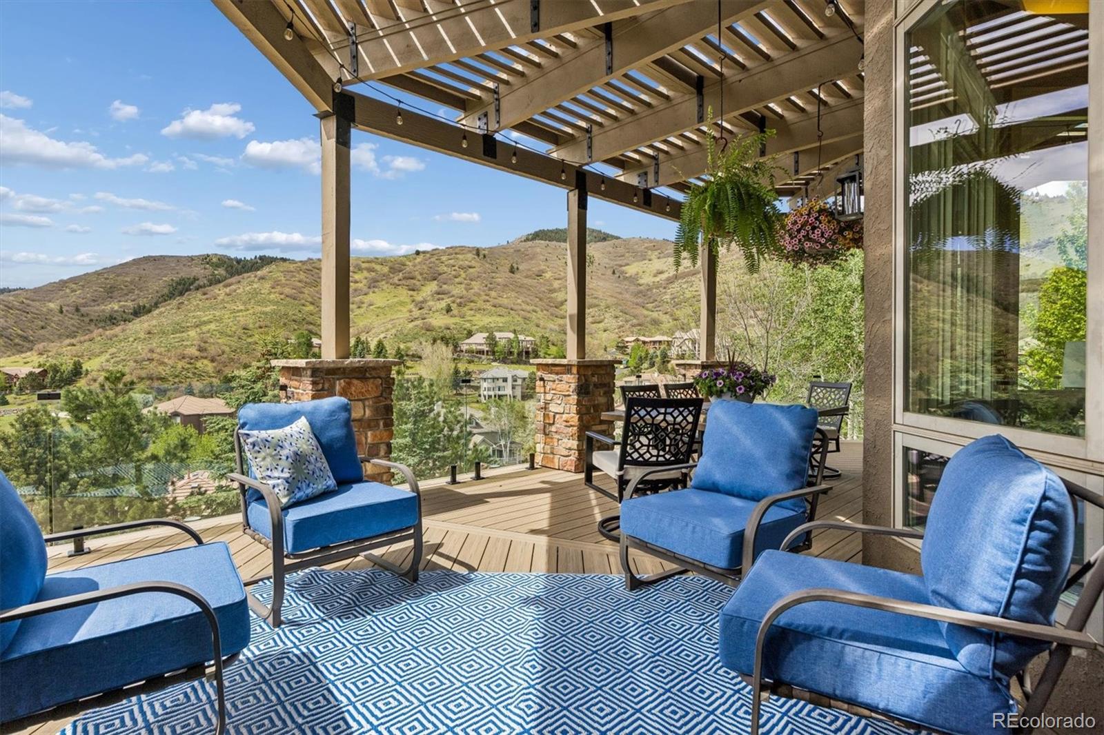 16422 Rocky Point Lane Morrison, CO 80465 - Photo 14 of 50 a building outdoor space with patio furniture
