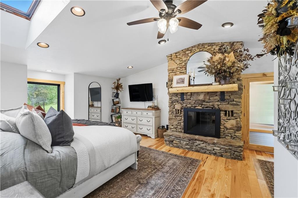 292 Golden Ridge Drive Somerset, PA 15501 - Photo 34 of 49 a spacious bedroom with a bed and a fireplace