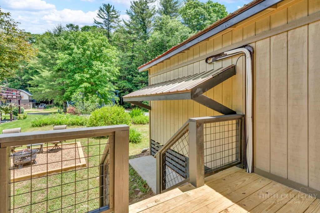 209 Meadow Loop Newland, NC 28657 - Photo 4 of 30 a view of outdoor space and deck