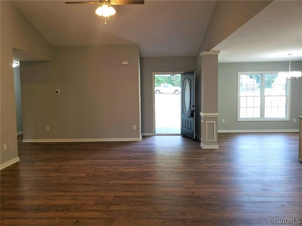 9202 Hunters Trail Road Petersburg, VA 23803 - Photo 6 of 17 an empty room with hard wood floors and window