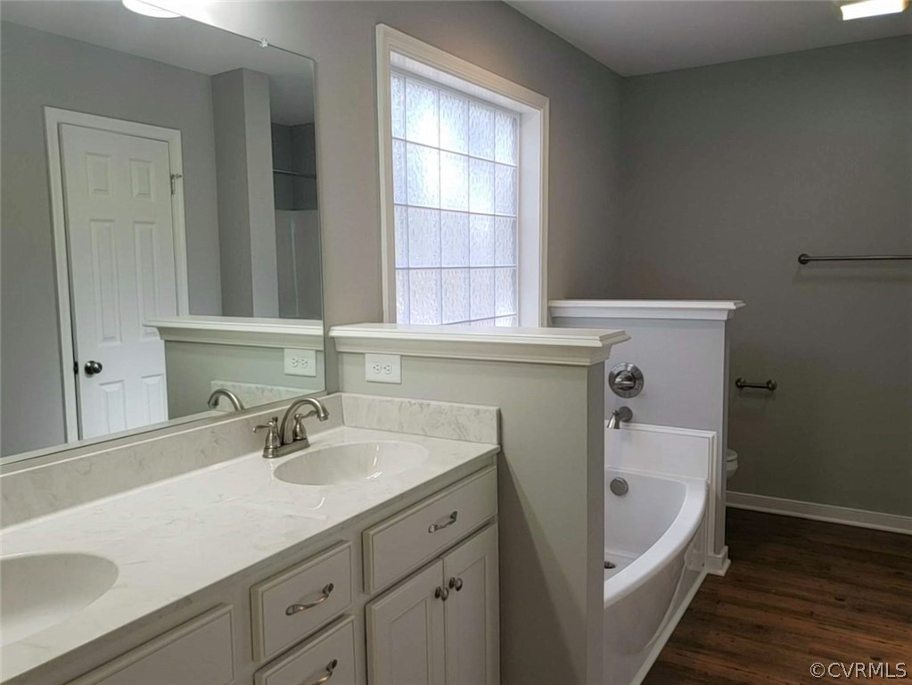 9202 Hunters Trail Road Petersburg, VA 23803 - Photo 10 of 17 a bathroom with a sink and a bathtub
