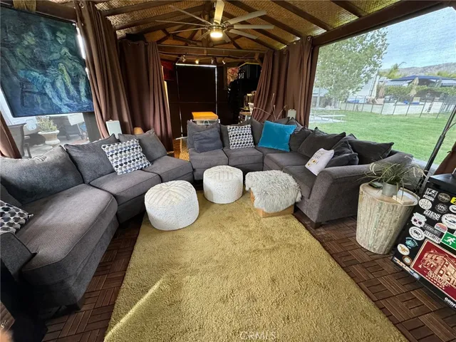 a outdoor living space with furniture and a garden