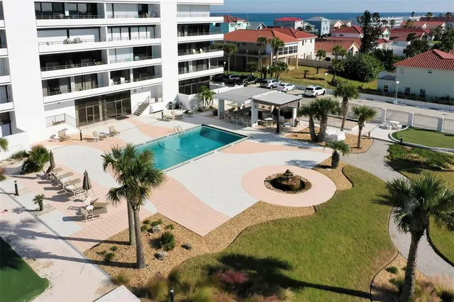 a view of a lake with a floor to ceiling window