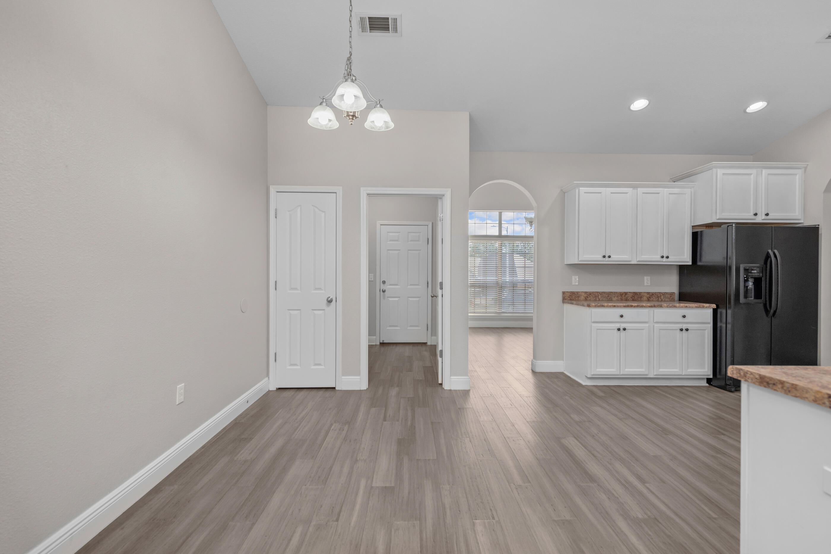 760 Lime Lane Crestview, FL 32536 - Photo 15 of 46 a view of a kitchen with wooden floor